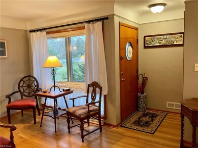 Front door entry with  a guest coat closet - not p