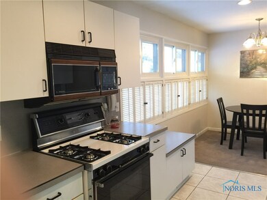 BRIGHT OPEN KITCHEN WITH GAS STOVE. ALL APPLIANCES