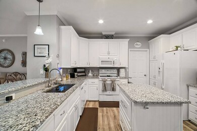 Granite countertops and tiled backsplash