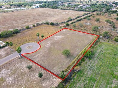 Birds eye view of property featuring a rural view