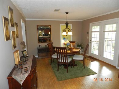 Dining Room Open to the Kitchen. Door to the covered back deck. 
