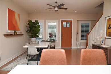 Dining room with baseboards, a ceiling fan, reces