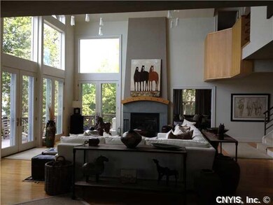 Living Room. View from Kitchen to LR w/4 sets of a