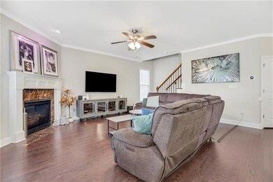 Living room featuring ornamental molding, ceiling 