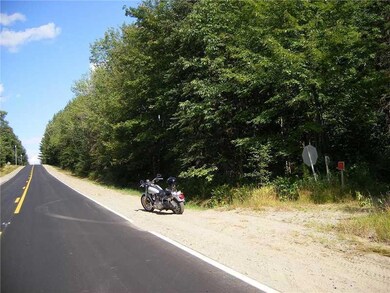Land. Good yearround paved road,...