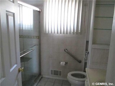 Bathroom. Full tile bath with low step 5 Ft wide s