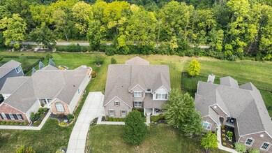 Treelined backyard and next to Midland Trail connecting Westfield and Noblesville