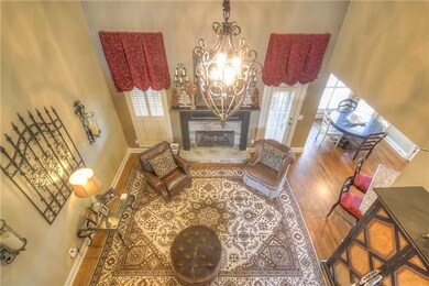 Ineradicable living room features hardwood floors,