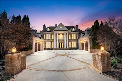 Greek revival house featuring french doors, stone 