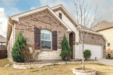 View of front of home featuring an attached garage