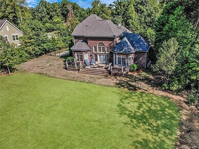 Flat, clear, and fully fenced back yard. Plenty of