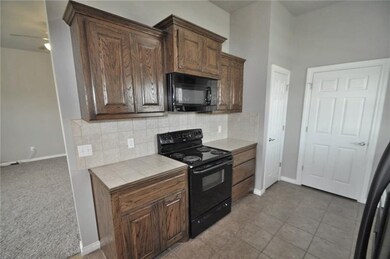 Kitchen  Your kitchen includes tile floors, stagge