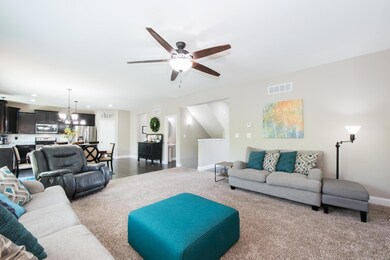 Large open floor plan with neutral walls and floor