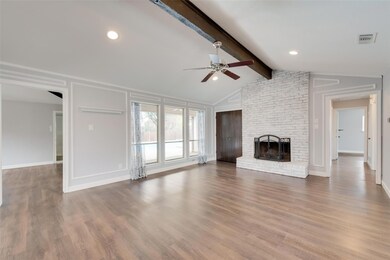 Step into the spacious and inviting living area, b