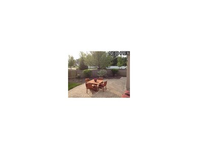 Fenced in Yard with Brick Paver Patio