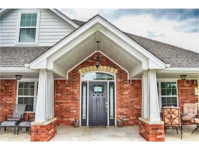 Dramatic cathedral entry with Craftsman-style colu