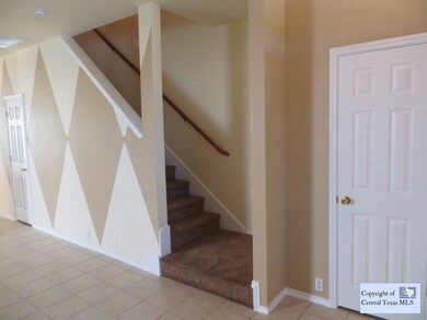 Stairs: The home has been freshly painted.