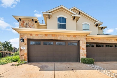 Nestled on a private corner lot, this residence offers an extra level of privacy not often found in townhome living.