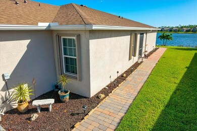 Walkway to entry door. Showcasing added pavers ext