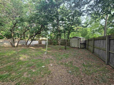 Rear fenced in private yard.  One of two private fenced in yards.