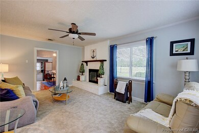 Brick fireplace with gas insert.