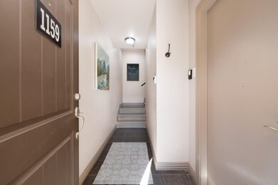 Private entry with attached garage to the right