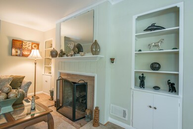 Living Room with Fireplace and built ins