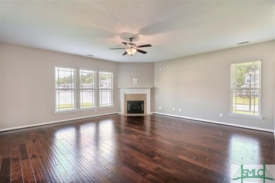 Living room with wood burning fireplace