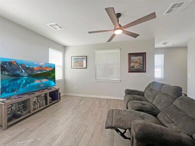 Living room featuring light wood finished floors,