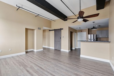 living room to kitchen and hallway