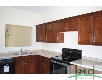 Kitchen. Plenty of cabinet space and pantry. Openi