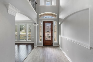 Front entry that opens to the formal dinning.