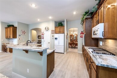 Kitchen with Breakfast Bar & Pantry. Open to Livin