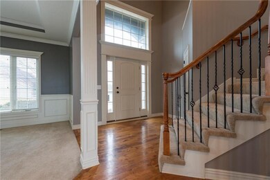 DRAMATIC TWO STORY ENTRY, INCLUDES CURVED STAIR CA
