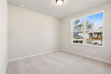 Unfurnished room featuring carpet. *Picture is not