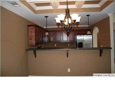 Large Eating area with coffered ceiling and Breakf