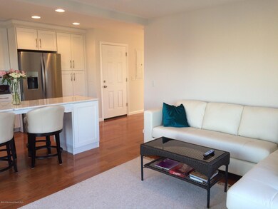 ANOTH ER VIEW OF KITCHEN AND FAMILY ROOM