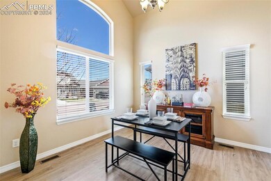 Dining area with light Luxury Vinyl plank flooring
