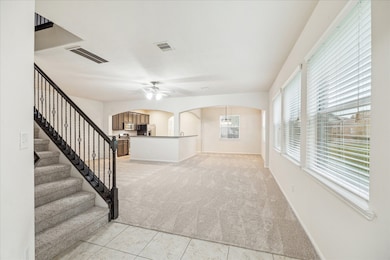 Tiled Entry Looking in to the Family Room, Dining
