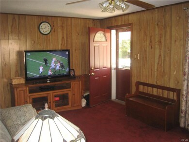 Living Room had hardwood floors under the carpetin