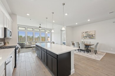 Bright open floor plan that flows from kitchento d