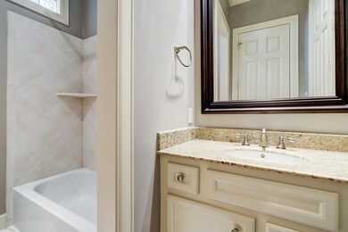 1st floor secondary  bathroom with granite counter