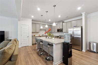 Kitchen featuring appliances with stainless steel 