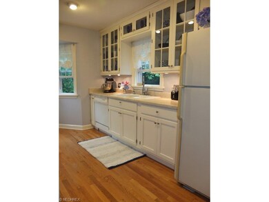 Kitchen with updated cabinets, countertops and har