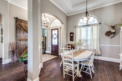 Formal dining room has plenty of room for your hol