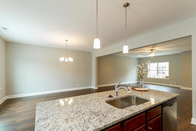 Kitchen with Granite, No Tile Backsplash. Full Stainless Steel Appliance Package