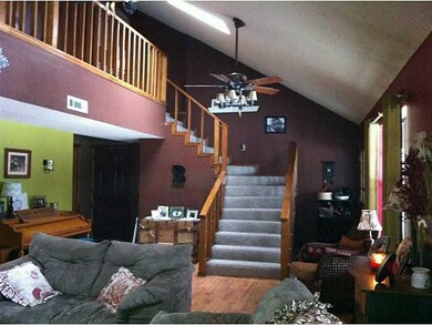 Living Room. Graceful stairs