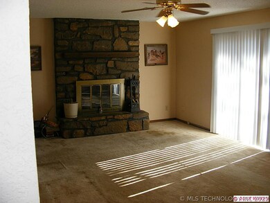 Large living area with lots of natural light