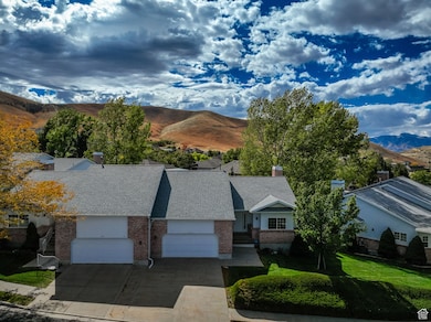 View of condo with mountain background.