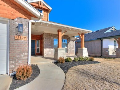 Property entrance with a garage and a porch